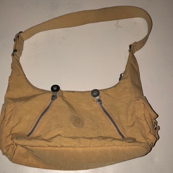 Kipling Handbags - Kipling- morrissey bag. Nylon yellow/gold color